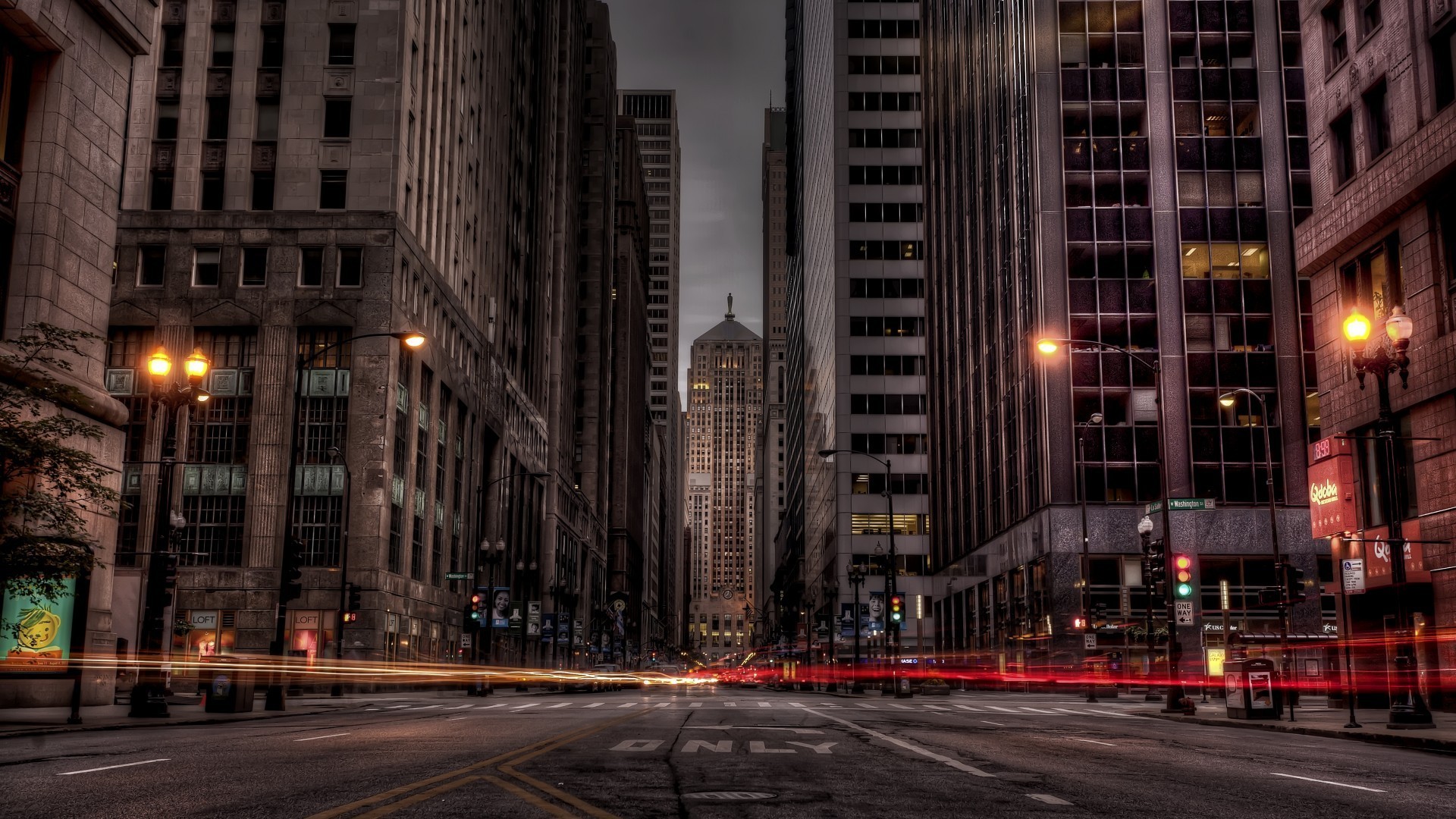 Crowded city street with vibrant neon reflections at night
